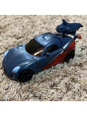 2009 Transformers Revenge of the Fallen Smokescreen Deluxe Class Figure ~ Hasbro